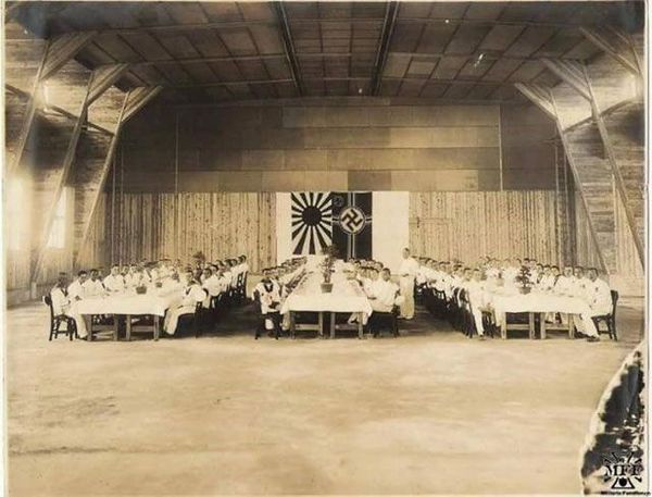 Japanese Naval Ship Flying Rising Sun Flag Docks at Busan